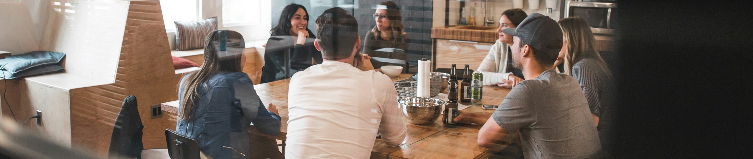 The Psychology Of Networking: Why It Matters And How To Get Better At It 1 networking group of people sitting at table